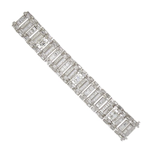 Art Deco bold geometric diamond chevron strap bracelet, French, set with rectangular and baguette cuts featuring three principal diamonds of 4.08ct E VS2; 3.74ct H SI1 and 3.65ct J VS2,